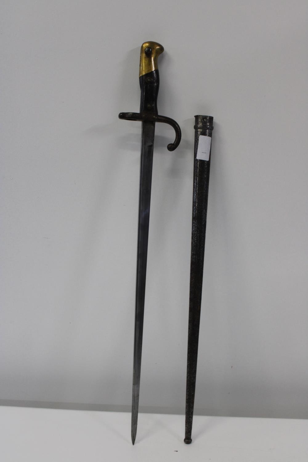 A 1875 French bayonet D'ormes de St Ettiene Gras dated 1880 with scabbard