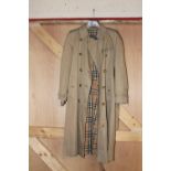 A Ladies Burberry rain coat