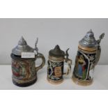 Three collectable German Steins. Tallest is 25cm tall