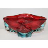 A heavy piece of two tone art glass in the form of a bowl. 27cm x 14cm