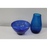 Two pieces of classic blue art glass. Vase is 27cm tall