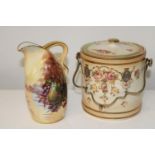 A Crown Devon hand painted & signed jug along with a biscuit barrel.