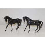Two bronze horse sculptures. 19cm tall