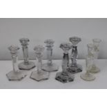 An assortment of quality glass candle sticks