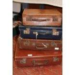 Four assorted vintage suitcases