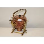 A stylish copper & brass spirit kettle