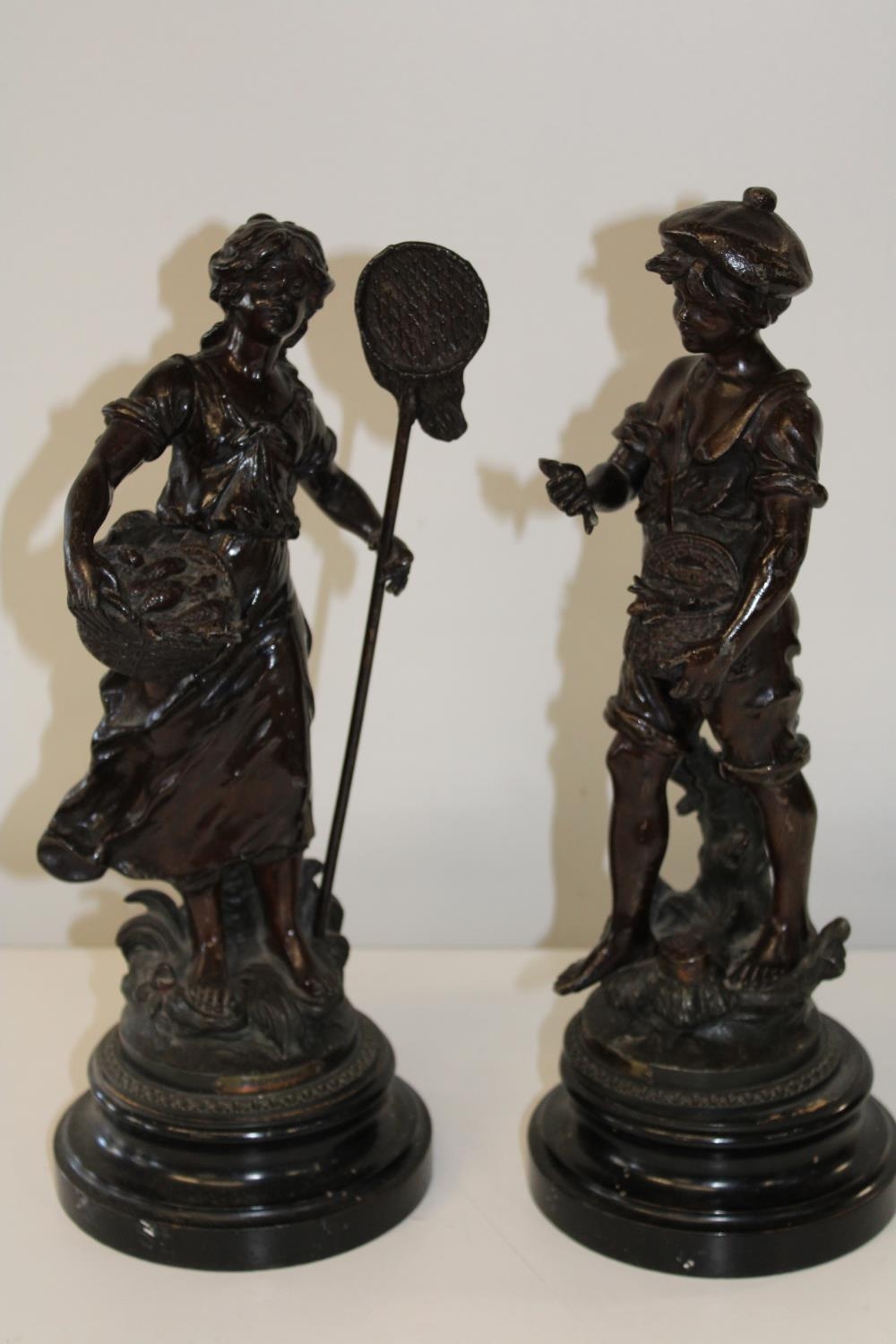 Two quality spelter figures on wooden bases with signatures & foundary marks. 42cm tall