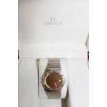 A 18ct gold & bi-metal Omega Constellation automatic wrist watch in original box.