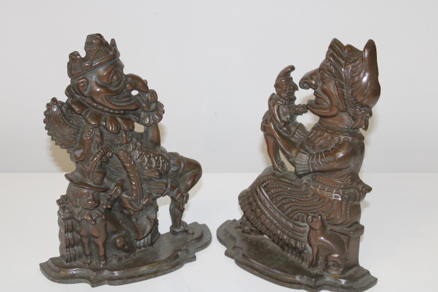 A pair of antique cast "Punch & Judy" doorstops. 26cm tall