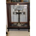 A cased set of vintage scientific scales (damage to the marble base) 50cm x 30cm x 28cm collection