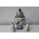 A Chinese lidded ginger jar & two vases