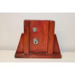 A wooden door & lock display. Height 39cm, width at bottom 49cm Top 29cm