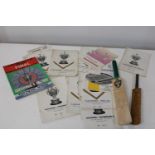 Two miniature cricket bats and selection of vintage rugby programmes