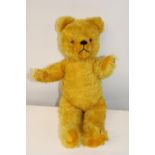 A vintage golden mohair teddy bear with growler 49cm tall