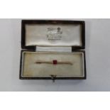 A vintage bar brooch marked 15T in original case