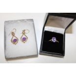 A 9ct gold ring & pair of 9ct gold drop earrings, both with semi precious stone settings