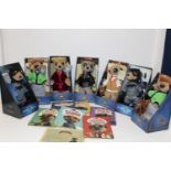 A selection of boxed Meerkats & books etc