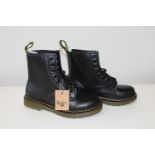 A new pair of small black boots size 2