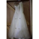 A white wedding dress with veil