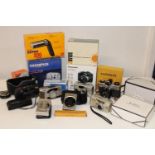 A box full of assorted camera equipment