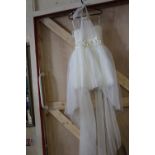 A modern white wedding/prom dress
