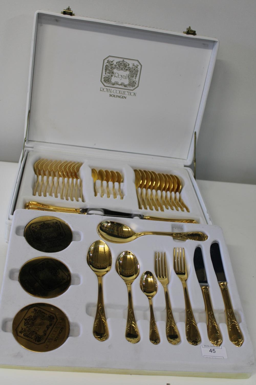 A cased set of Solingen Royal Collection gold plated cutlery (50 pieces in total)