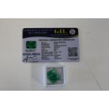 A Emerald gemstone with cert