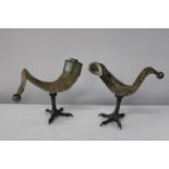 A pair of horn sculptures on cast clawed feet by J Anthony Redmile. Height 26cm, Width 31cm