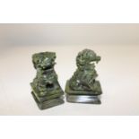 A pair of Chinese Jadeite Foo Dogs