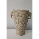 A heavy Oriental rein vase. Height 30cm
