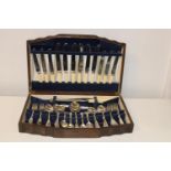 A boxed set of vintage cutlery (complete)