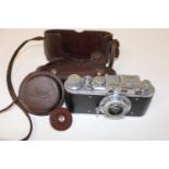 A Leitz Elmar 1:3,5 F=50mm camera & case. Stamped No 10432 and with a Luftwaffe emblem
