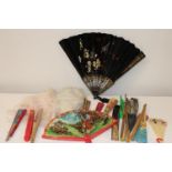 A job lot of assorted hand held fans (sold as seen)