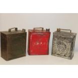 Three vintage petrol cans