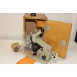 A wooden cased vintage microscope. Case Height 36cm ,Depth 27cm Width 20cm