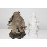 Two ceramic Buddha figurines 22cm tall