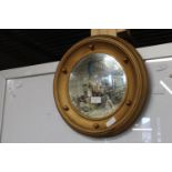 A vintage style porthole mirror 39cm in diameter