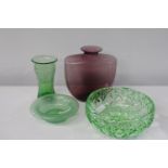 Four pieces of assorted coloured art glass