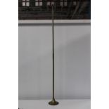 A vintage brass hunting horn 120cm in length