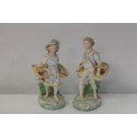 A pair of late 19th century Dresden ceramic figures 34 cm tall