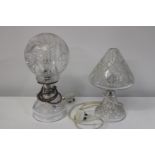 Two cut glass electric hurricane lamps tallest 36cm