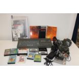 A Sinclair Spectrum ZX 2 with accessories & games