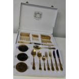 A cased set of Solingen Royal Collection gold plated cutlery (50 pieces in total)
