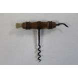 A Victorian boxwood cork screw