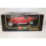 A boxed Burago model 1:18 scale