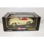 A boxed Burago model 1:18 scale