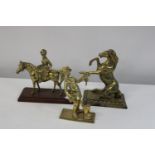 Three assorted brass figures