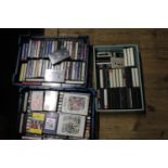 Three boxes of vintage music cassettes