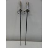 A pair of French 1886 pattern Label Epee style bayonets with cruciform blades