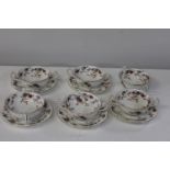 Six Minton's handled soup bowls & five saucers 'Ancestral' pattern